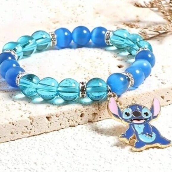 Disney Jewelry - DISNEY Silver & Blue Stitch Charm‎ Bracelet (BRAND-NEW & SO CUTE!)
